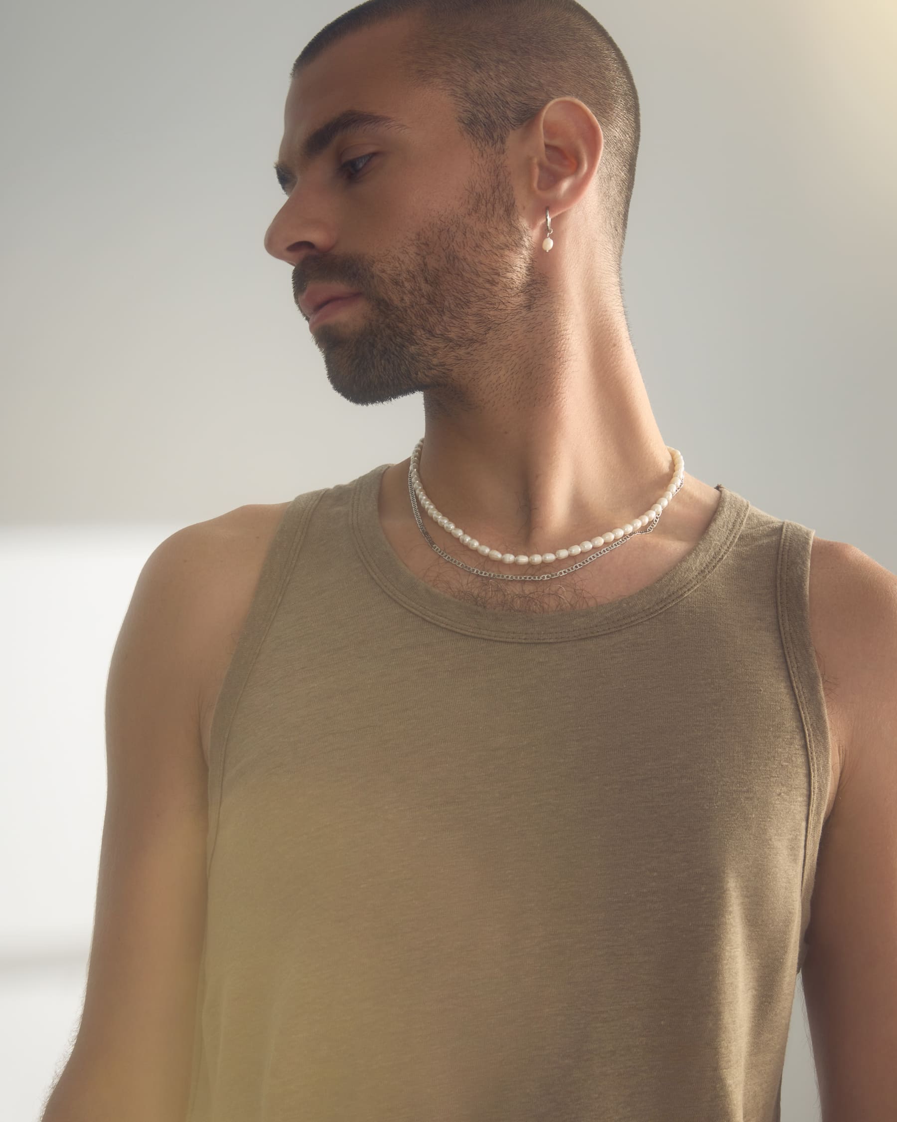 Chaîne Raphael, collier Isaac et boucles d'oreilles Axel argent